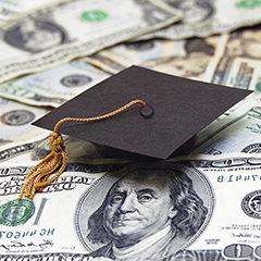 Image of money and graduation cap
